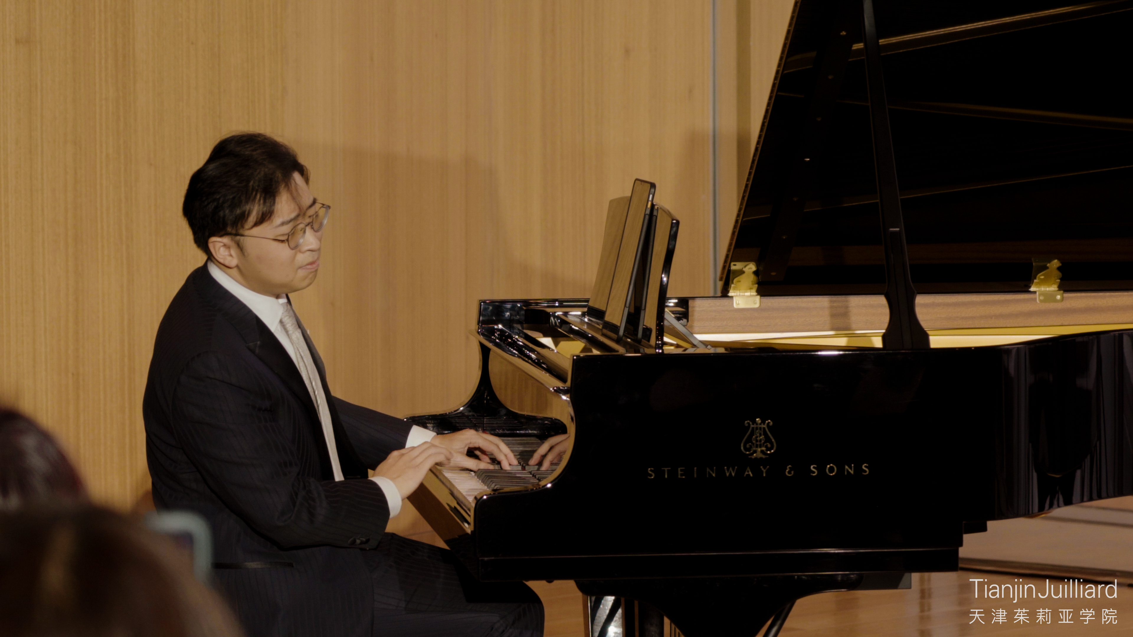 Using a Steinway Spirio player piano, faculty member Alvin Zhu performed a piano duo with himself as part of the ceremony.