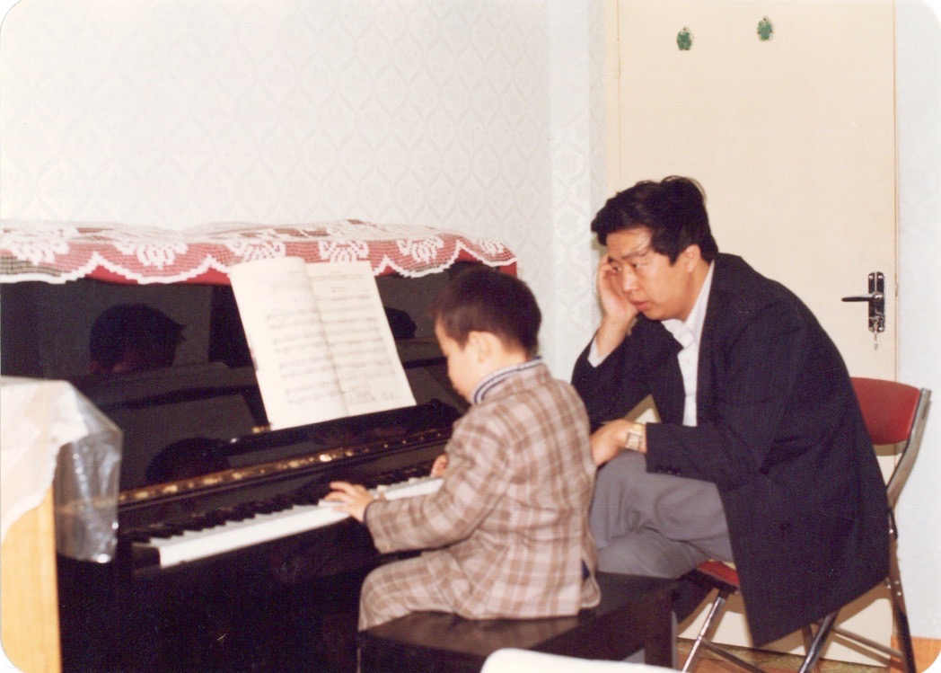 Xiaohan Wang accompanied by his father. Photo credit: Xiaohan Wang 