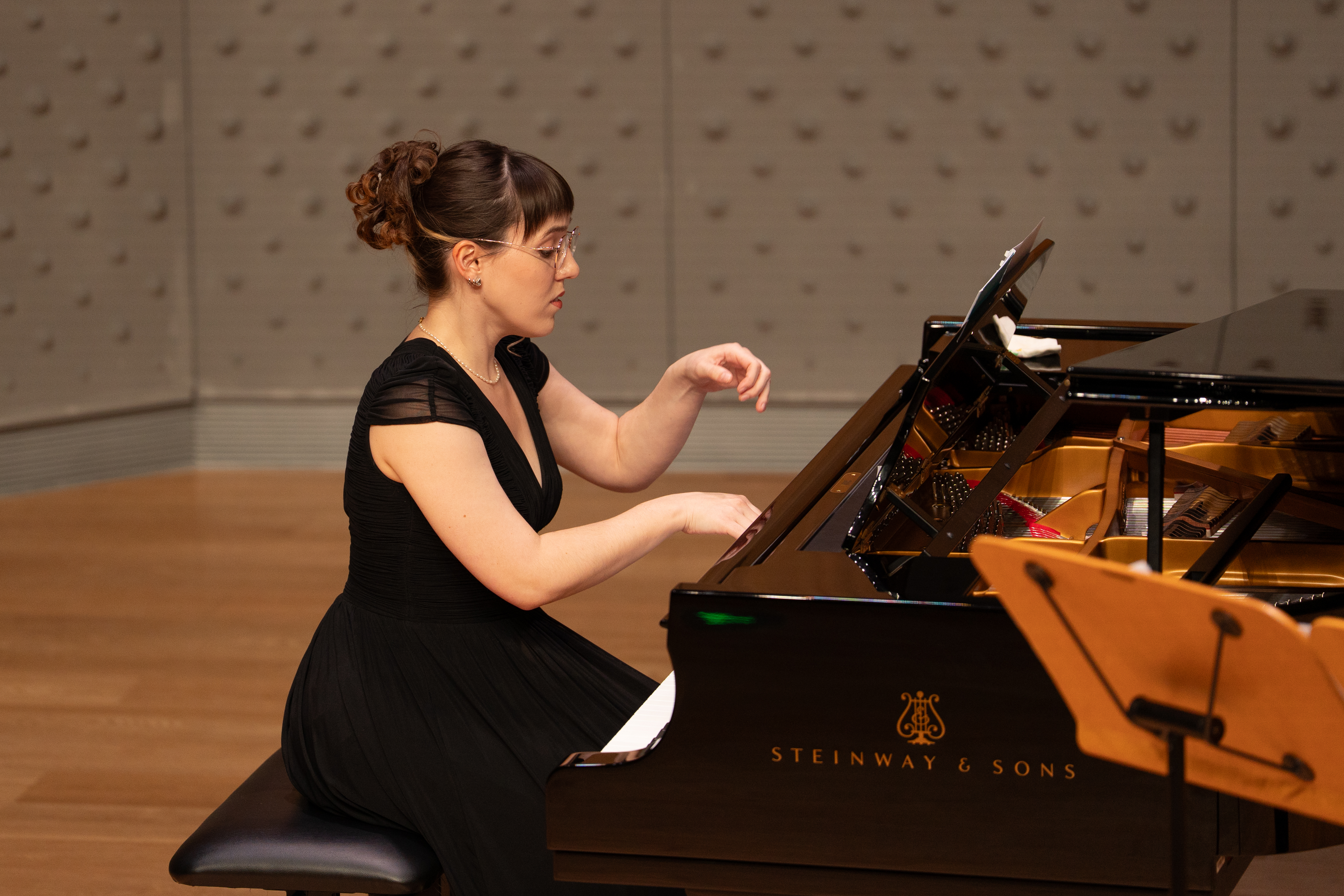 Anna Zhukova performing at the graduation recital in April 2025