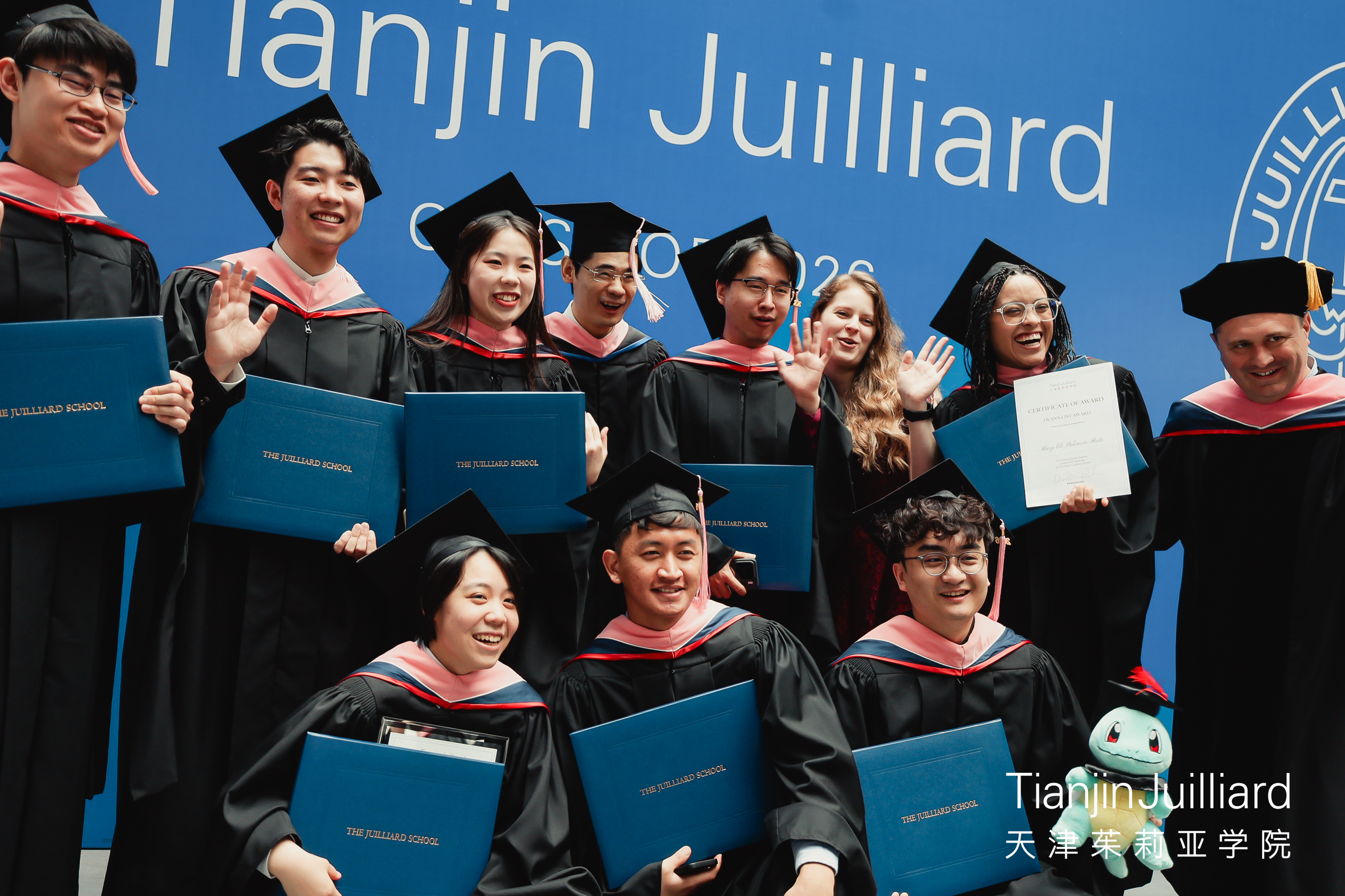 Graduates and faculty of violin studio at Commencement