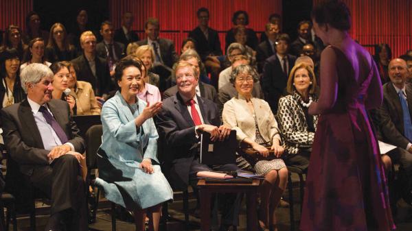 The first lady of China, Peng Liyuan, sitting between Juilliard's president, Joseph W. Polisi (to her left), and chairman, Bruce Kovner (to her right), coached Juilliard soprano Liv Redpath on a traditional Chinese song.