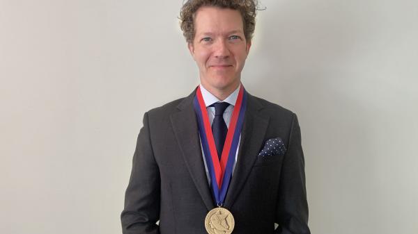 Alex Brose with President's medal 