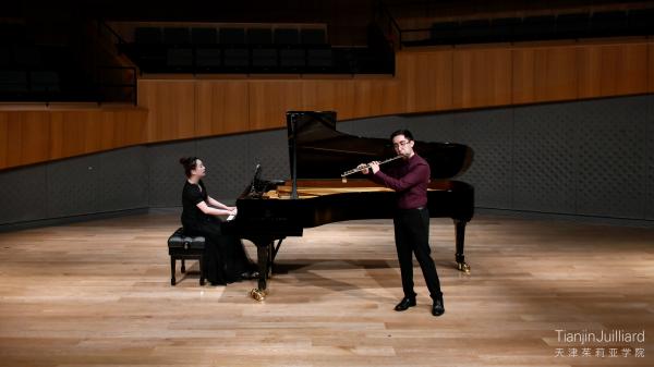 Diego Acosta performing at a flute studio recital