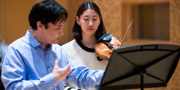 Violin student and teacher